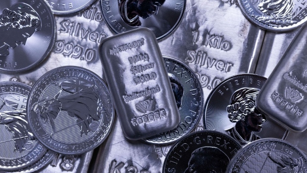 <p>A selection of silver bars and one-ounce silver coins arranged at Gold Investments Ltd. bullion dealers in London, UK, on Tuesday, May 21, 2024. </p>